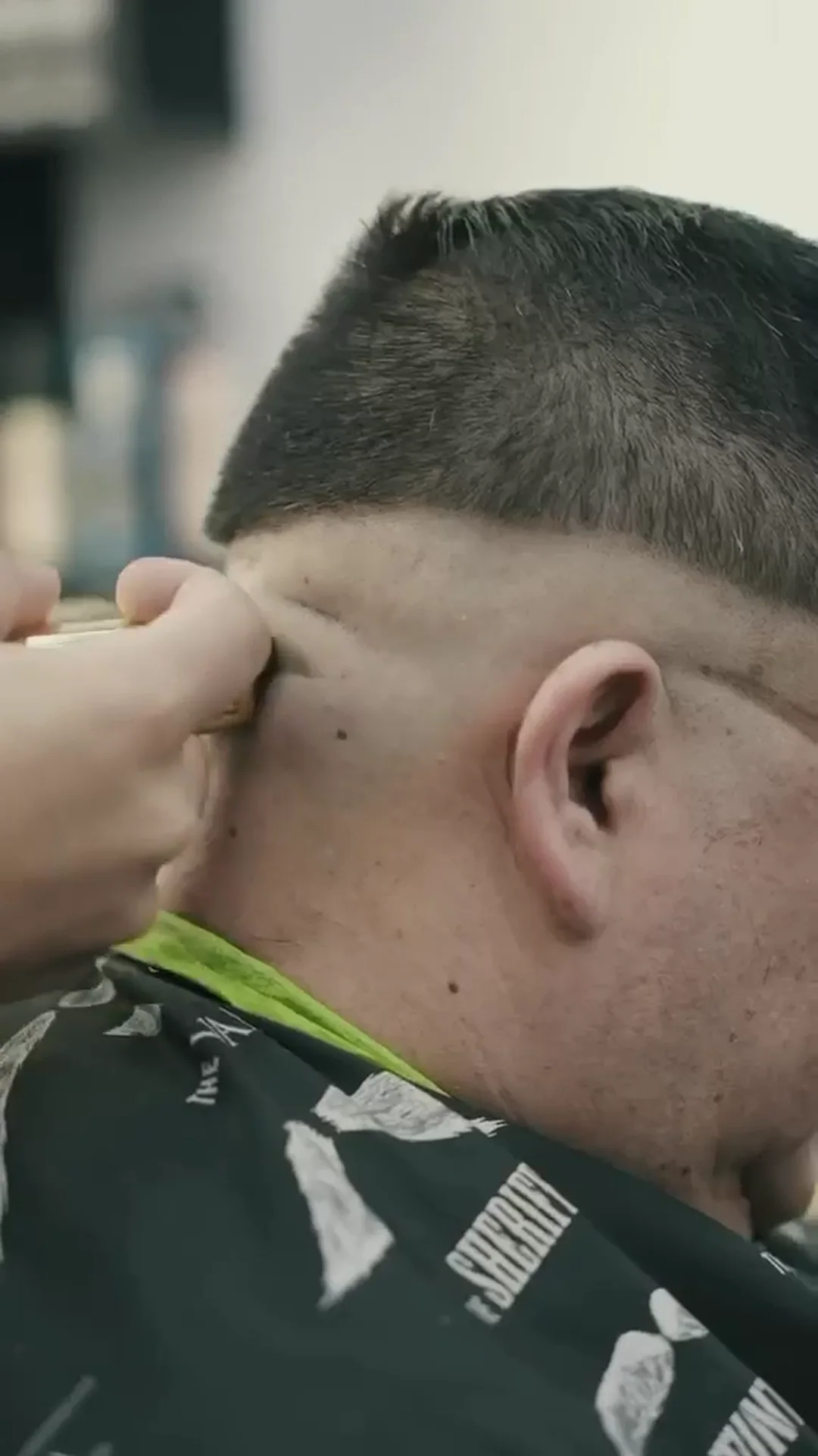 A tight neckline fade, close up