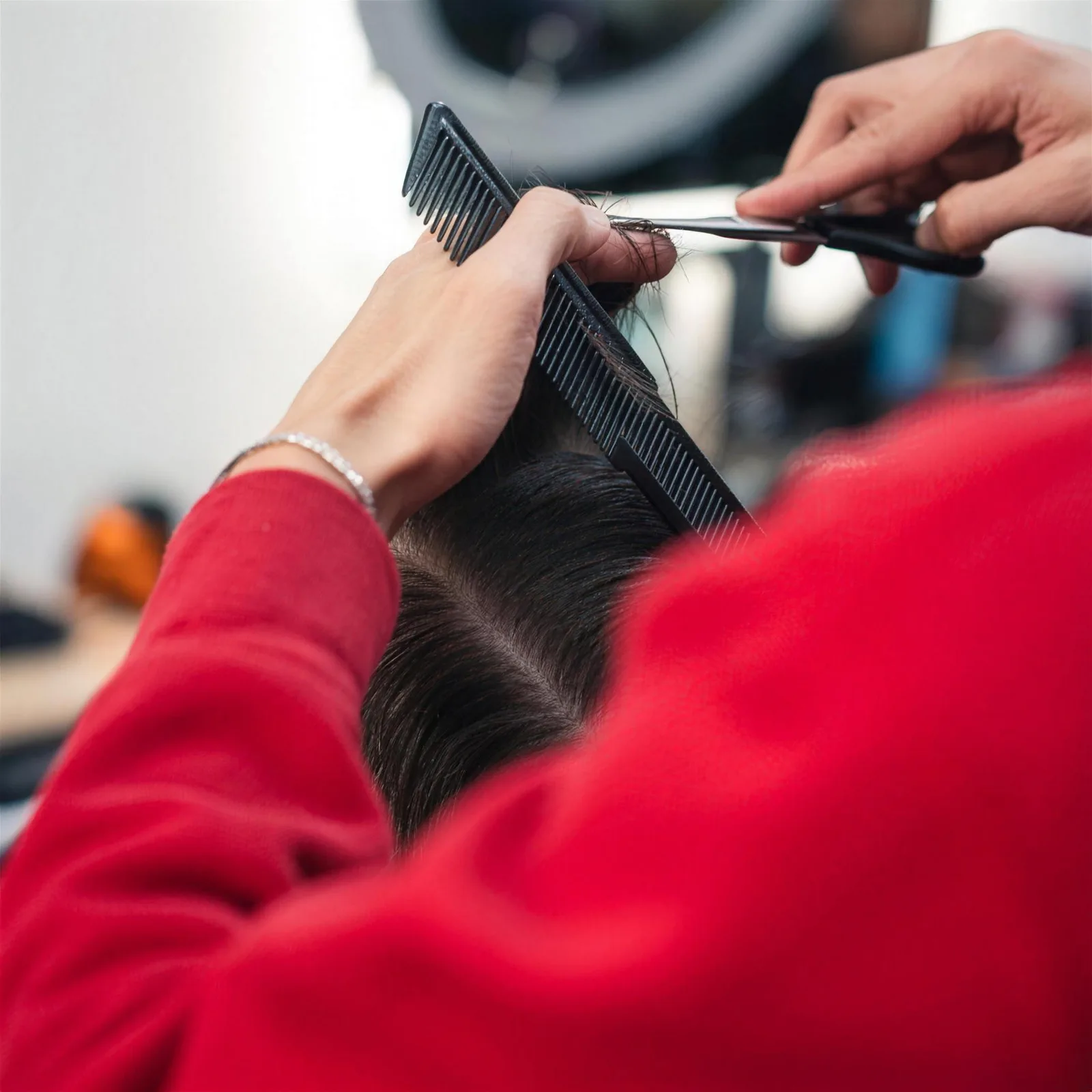 Scissor work over a comb
